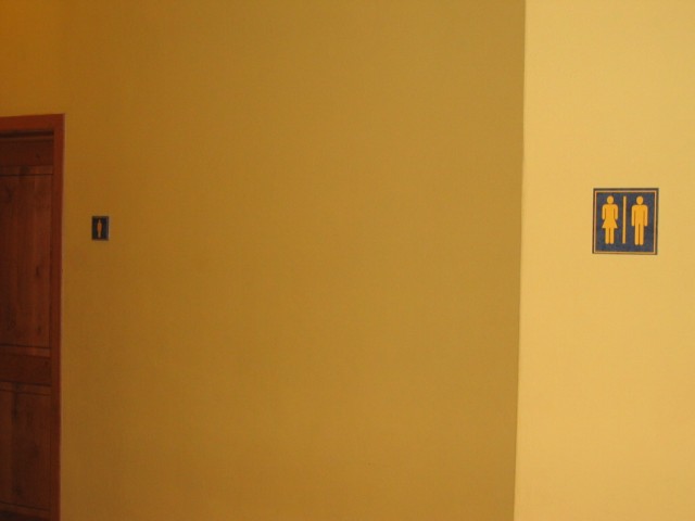 Confusing Bathroom Signage
Note the Men's room is on the left, but the bathroom sign indicates that it's on the right. Yes, I'm picky about these things :-)